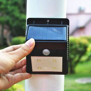 Solar Power 4 LED Motion Sensor PIR Wall Mount Garden Path Yard Door Light Lamp