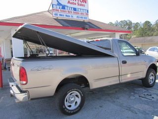 Leer Fiberglass Tonneau Cover for A 1999 2004 Ford F 150 Long Bed Pickup