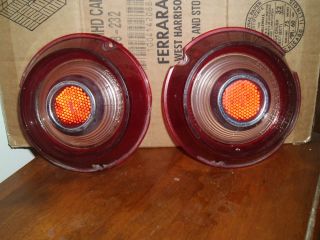 Two 1966 Chevy Corvair Guide 10 SAE RB 66 Lens Lights w Three Bezel Rings