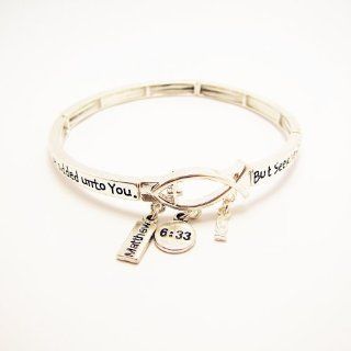 Inspirational Christian Fish Symbol Theme Stretch Bracelet; 2.5" Diameter; Silver Tone Metal; Ichthys, Jesus Fish Charms; Engraved Words But seek ye first the kingdom of God, and his righteousness; and all these things shall be added unto you. Matthe