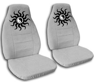 1990 Mustang GT seat covers. Front set of seat covers. Seperate headrest are included. Silver seat covers with a yin yang. Automotive